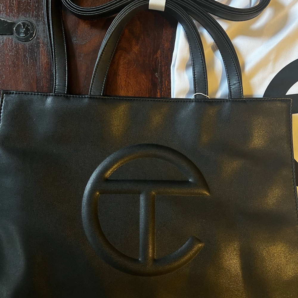 Brand New, factory folded with dustbag Telfar Medium Shopping Bag in Black